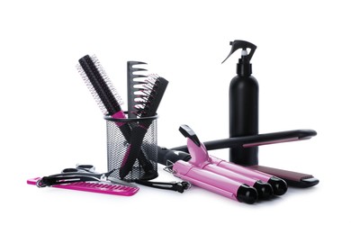 Different professional hairdresser tools on white background