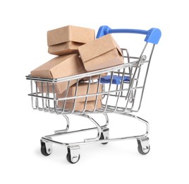 Photo of Small metal shopping cart with boxes isolated on white