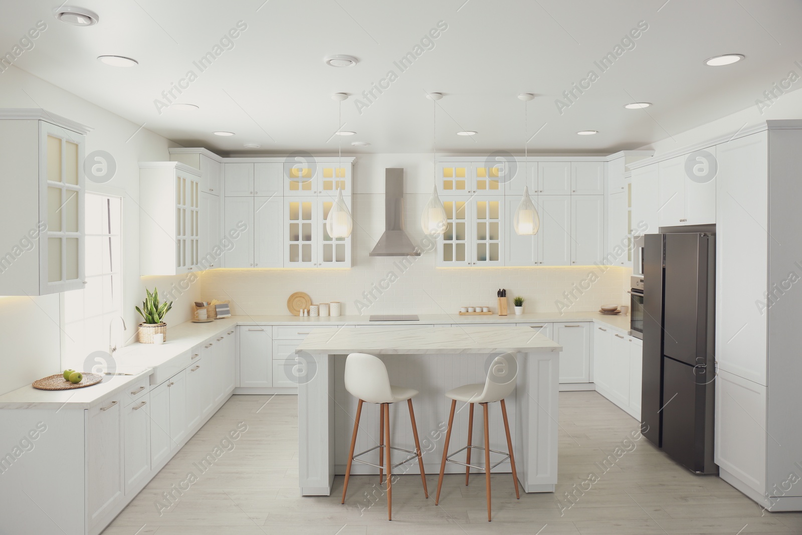 Photo of Beautiful kitchen interior with new stylish furniture