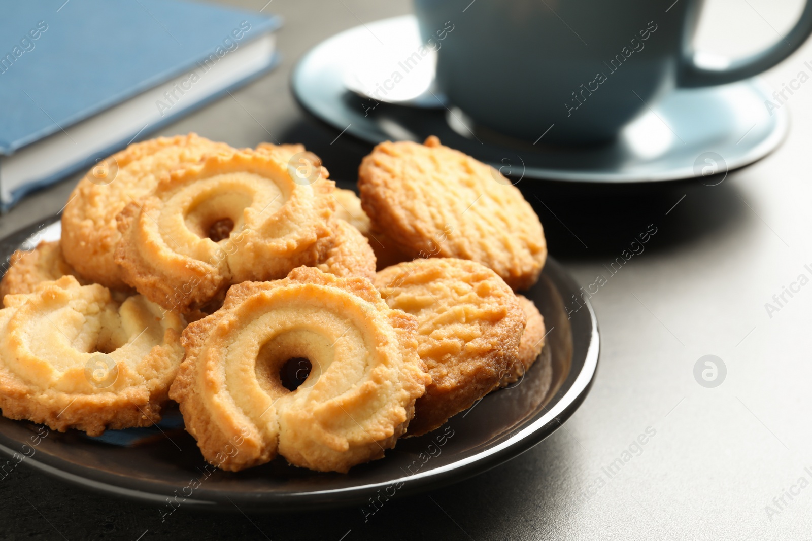 Photo of Plate with Danish butter cookies on table. Space for text