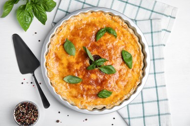 Delicious pie with minced meat on white table, flat lay