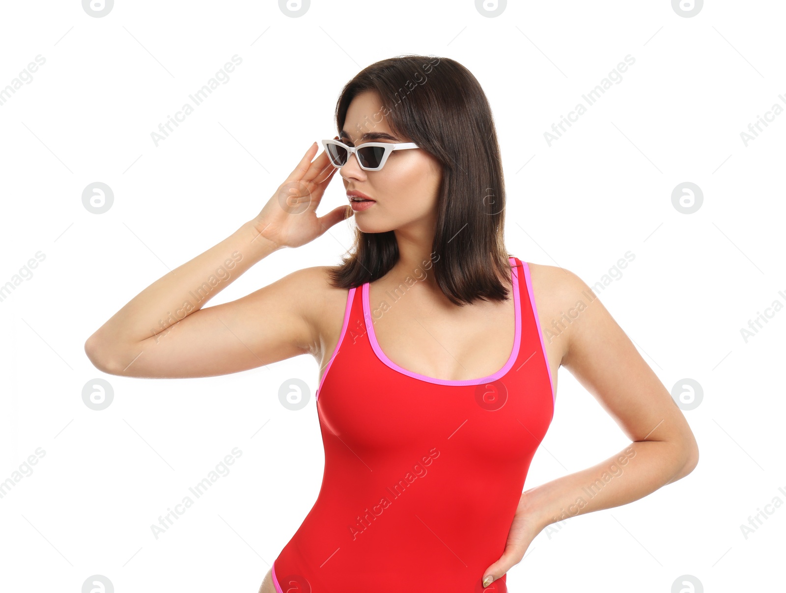 Photo of Beautiful young woman wearing swimsuit and sunglasses on white background