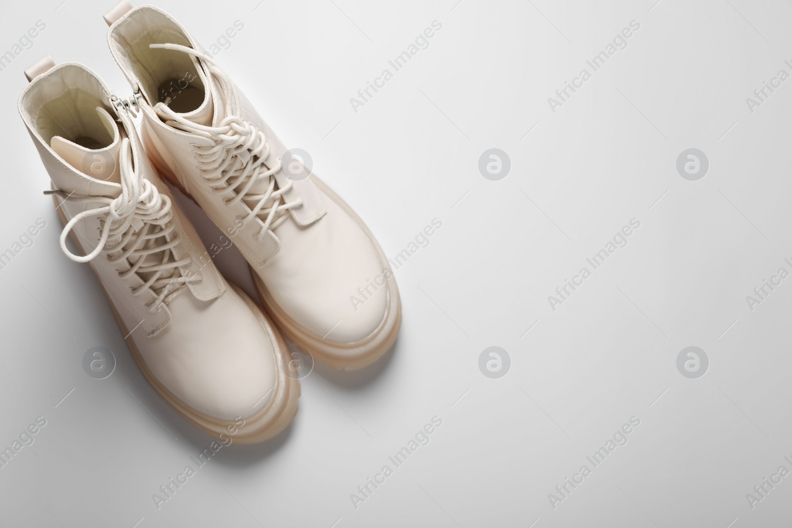 Photo of Pair of stylish leather shoes on white background, flat lay. Space for text