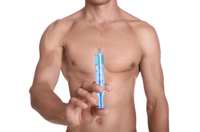 Photo of Athletic man with syringe on white background, closeup. Doping concept