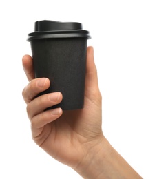 Woman holding takeaway paper coffee cup on white background