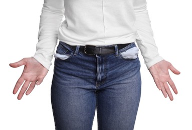 Poor woman showing empty pockets on white background, closeup