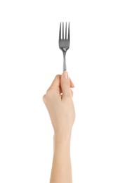 Woman holding clean fork on white background, closeup