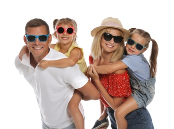 Photo of Happy family with children wearing sunglasses on white background