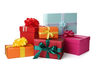 Photo of Colorful gift boxes with bows on white background