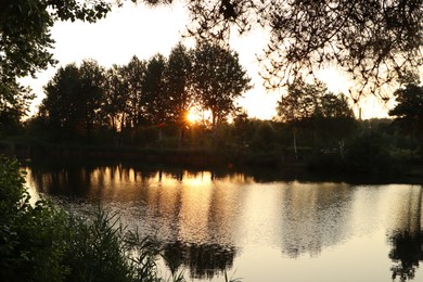 Photo of Picturesque view of countryside with river in morning