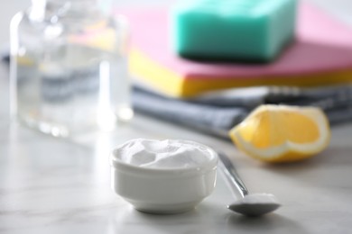 Baking soda on white marble table. Eco friendly detergent