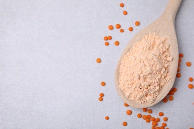 Spoon of lentil flour and seeds on white table, flat lay. Space for text