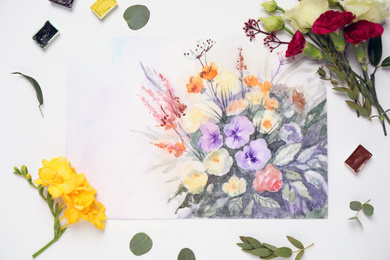 Photo of Flat lay composition with floral picture and watercolor paints on white background