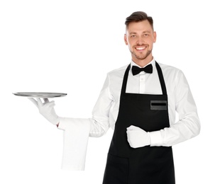 Handsome waiter with empty tray on white background