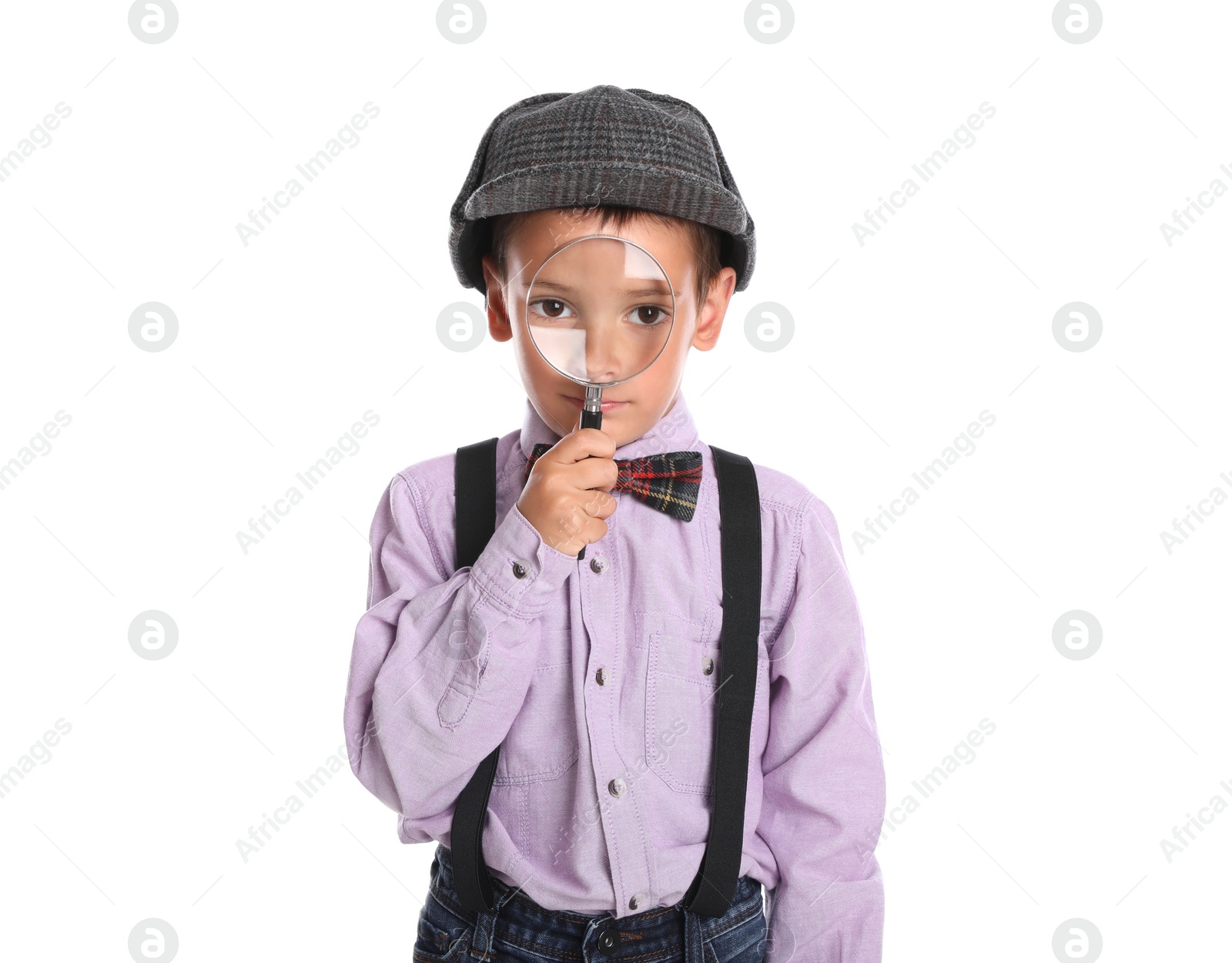 Photo of Little boy with magnifying glass playing detective on white background