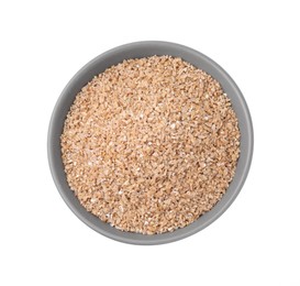 Photo of Dry wheat groats in bowl isolated on white, top view