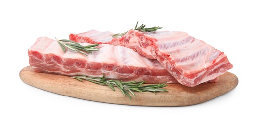Photo of Raw pork ribs with rosemary isolated on white