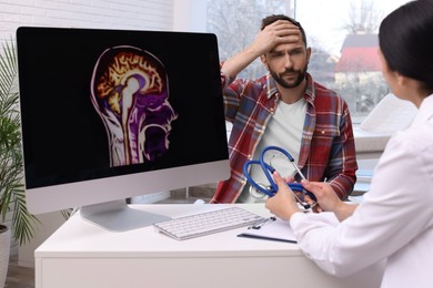 Man having appointment with neurologist in clinic