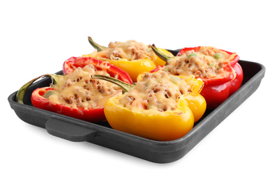 Photo of Tasty stuffed bell peppers in baking pan isolated on white