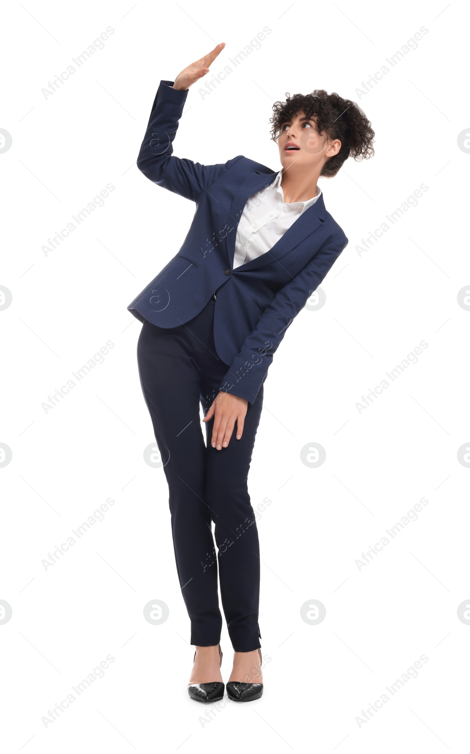 Photo of Beautiful young businesswoman in suit on white background