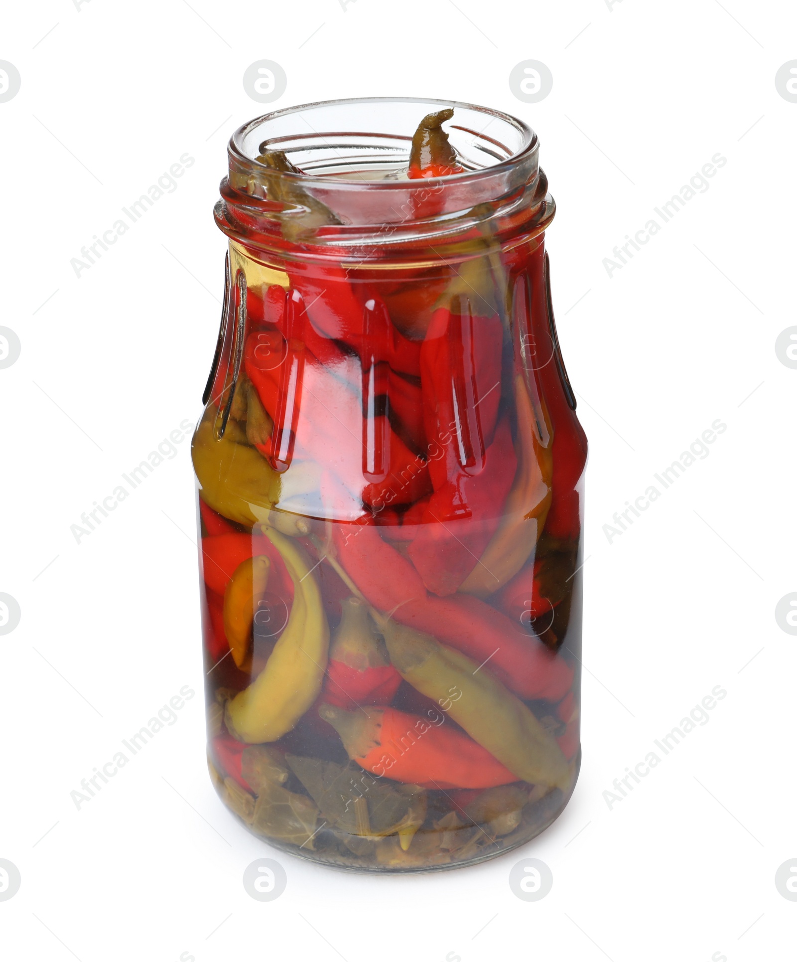 Photo of Glass jar with pickled chili peppers isolated on white