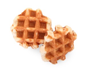 Photo of Two delicious Belgian waffles isolated on white, top view
