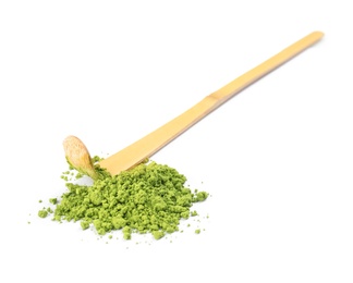 Photo of Powdered matcha tea and bamboo chashaku on white background