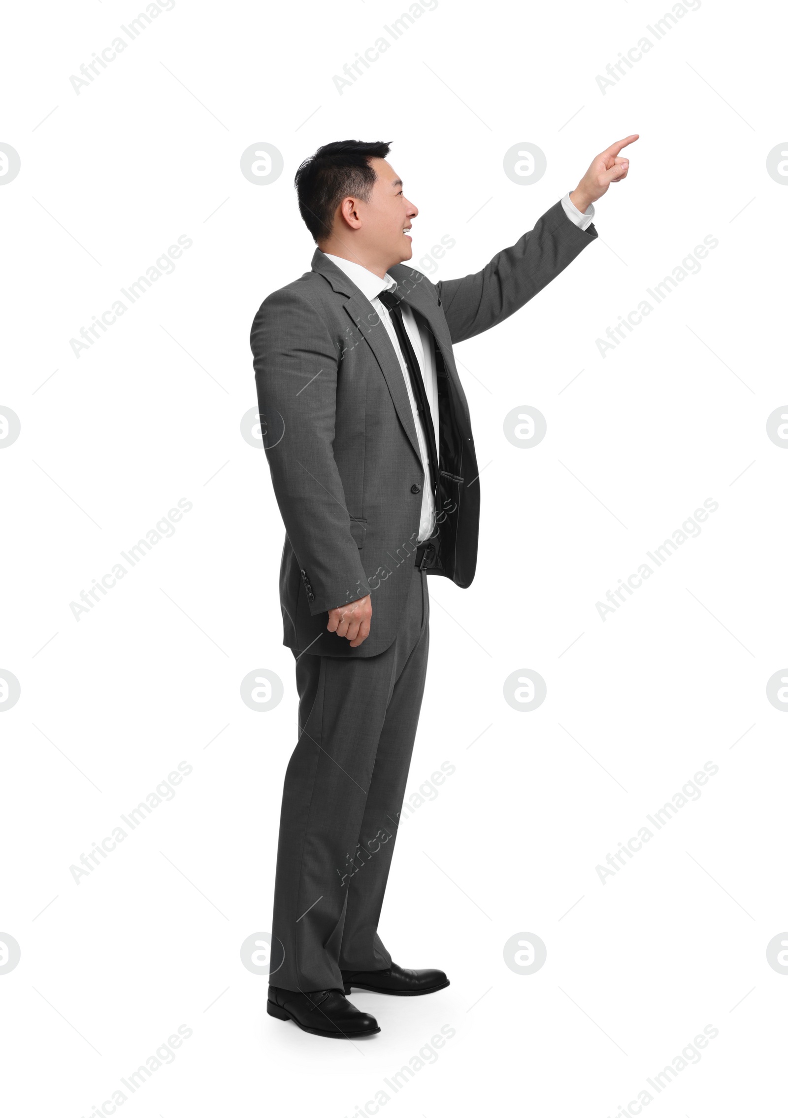 Photo of Businessman in suit posing on white background