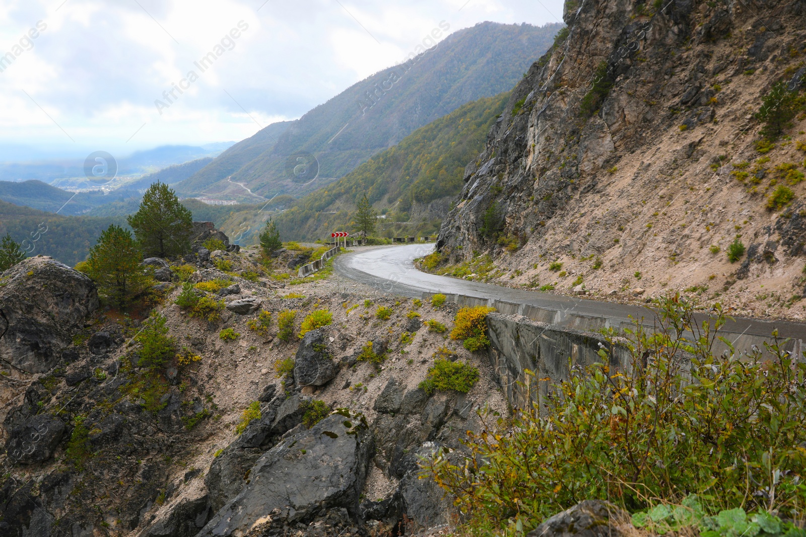 Photo of Picturesque view of empty road near mountains