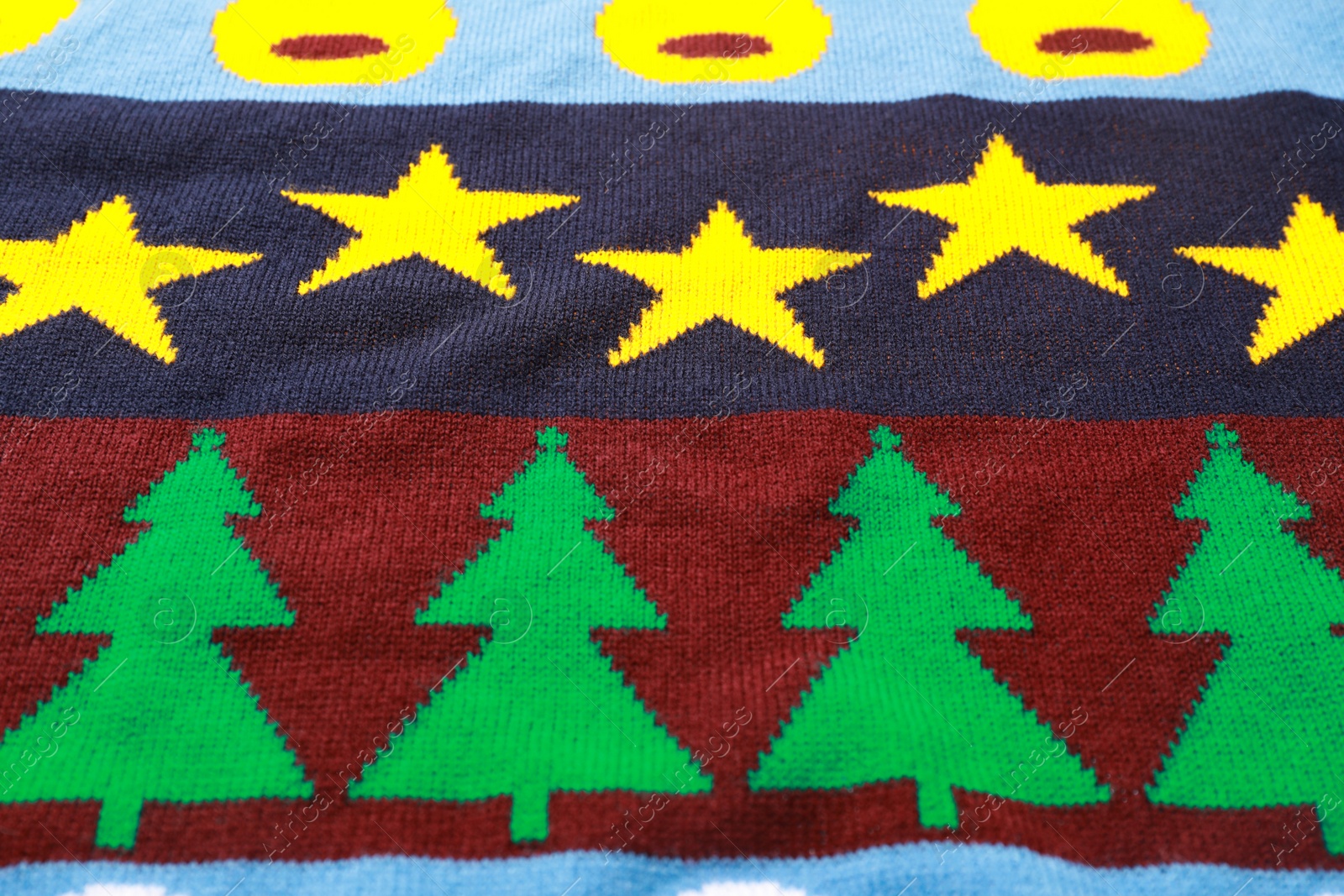 Photo of Warm Christmas sweater as background, closeup view