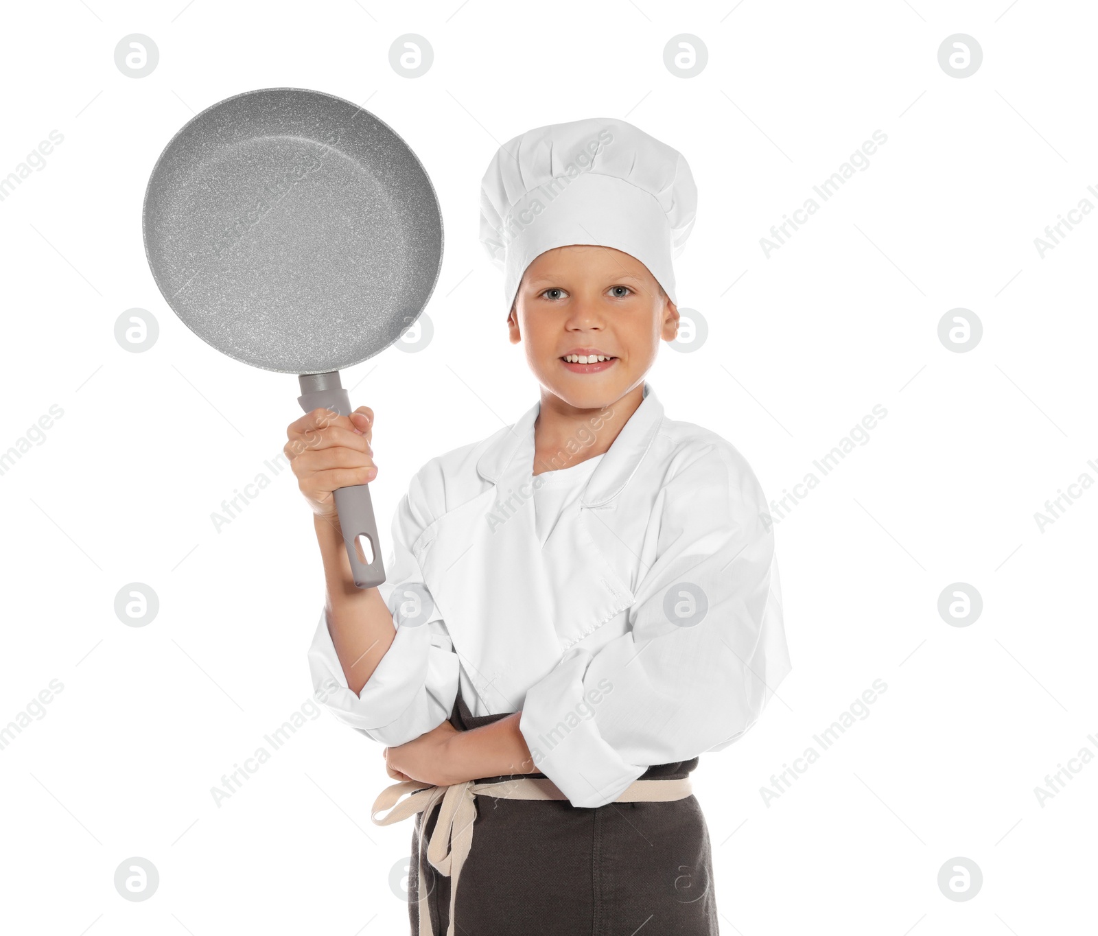 Photo of Portrait of little boy in chef hat with frying pan on white background