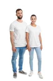 Young couple in t-shirts on white background. Mockup for design