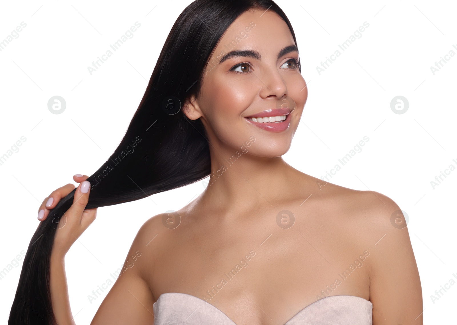 Photo of Portrait of beautiful young woman with healthy strong hair on white background