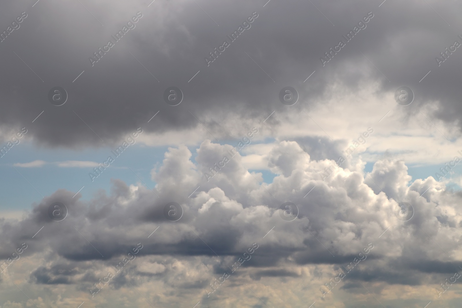 Photo of Sky with heavy rainy clouds on grey day