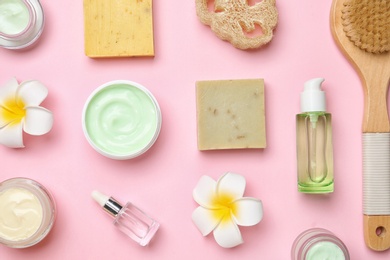 Flat lay composition with body care products on color background