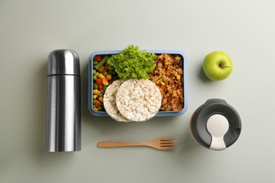 Photo of Flat lay composition with thermos and food on light grey background
