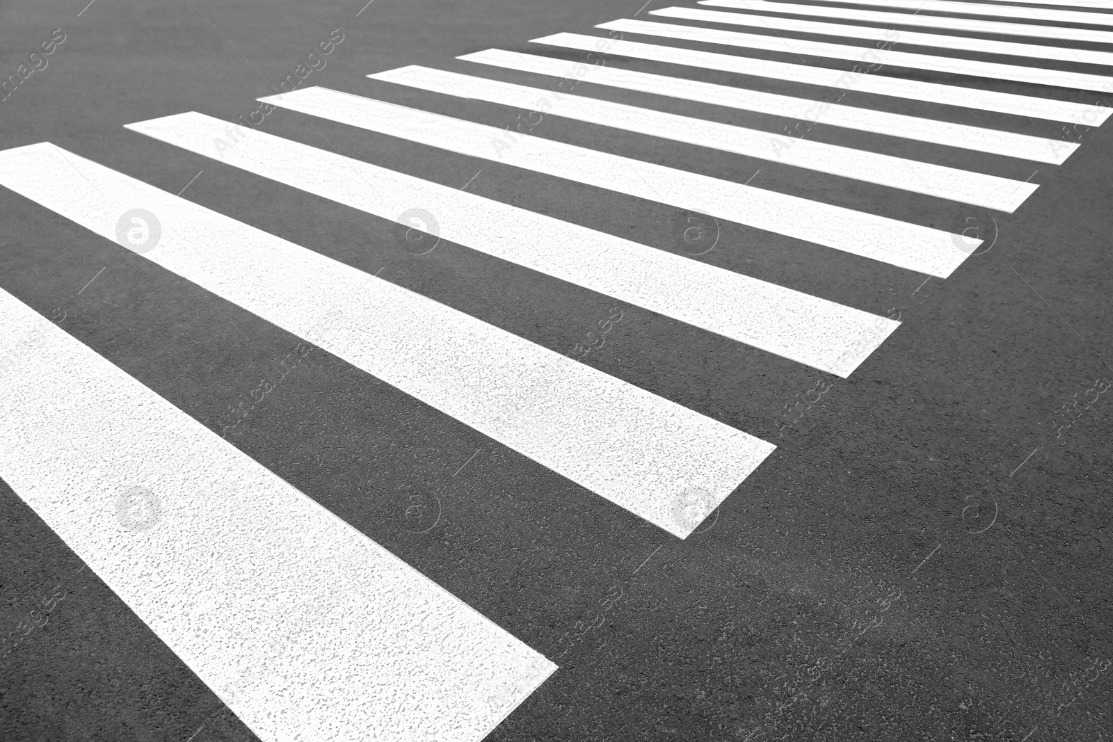 Photo of Pedestrian crossing on empty city street, closeup