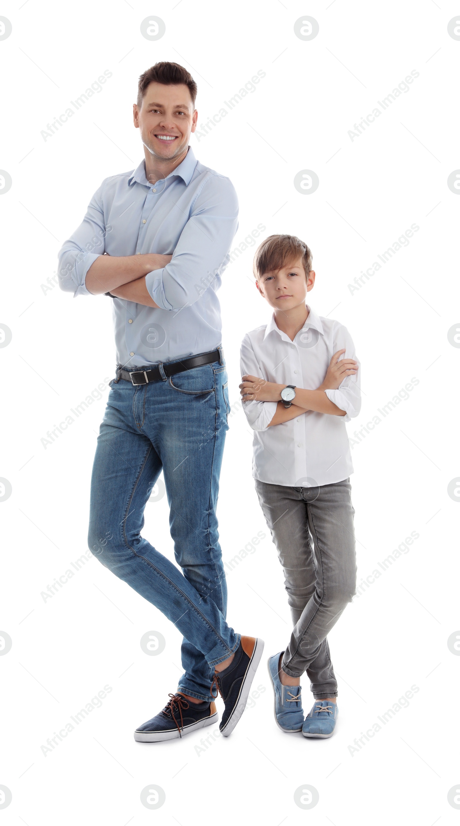 Photo of Portrait of dad and his son isolated on white