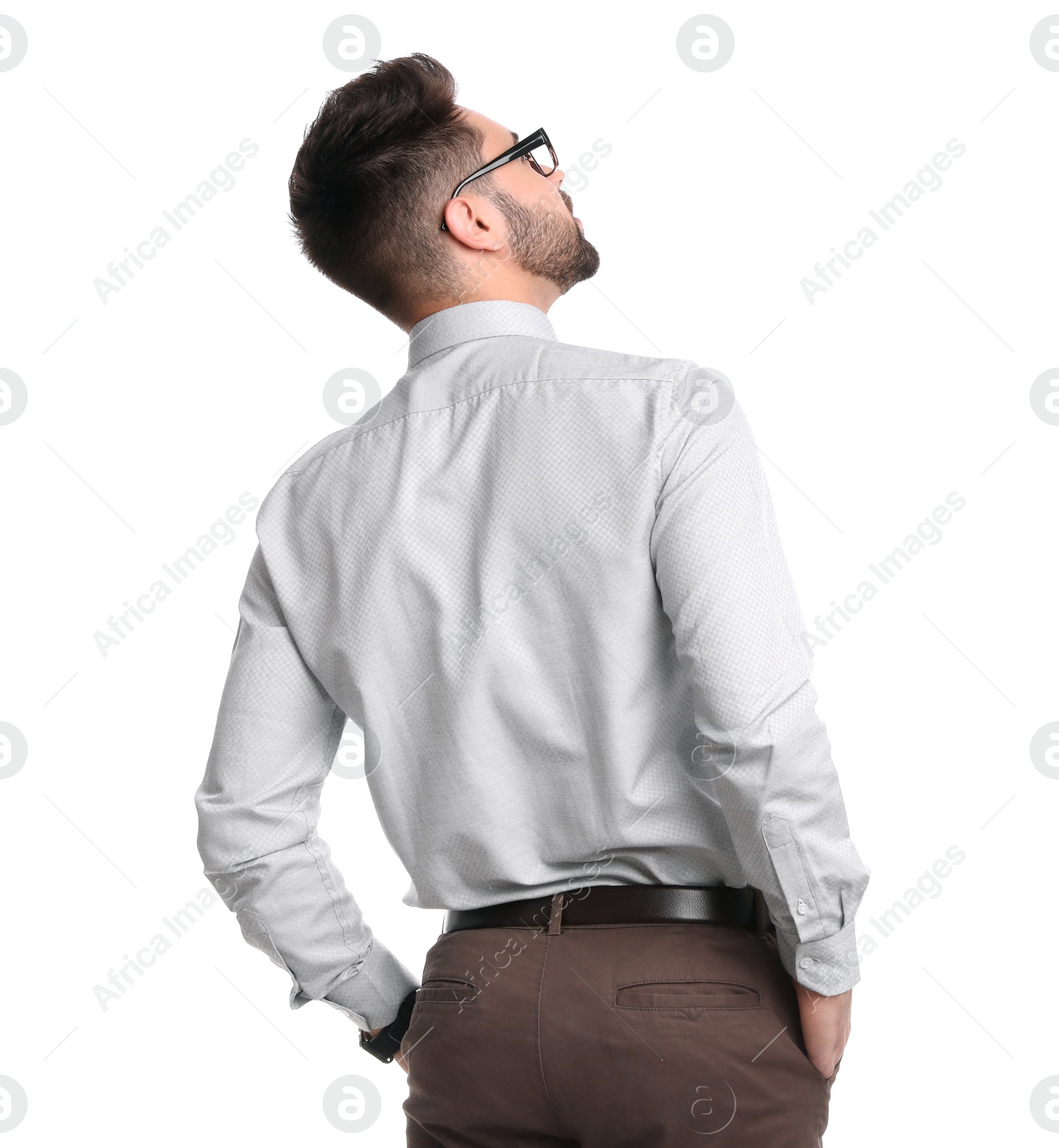 Photo of Young businessman in office wear on white background
