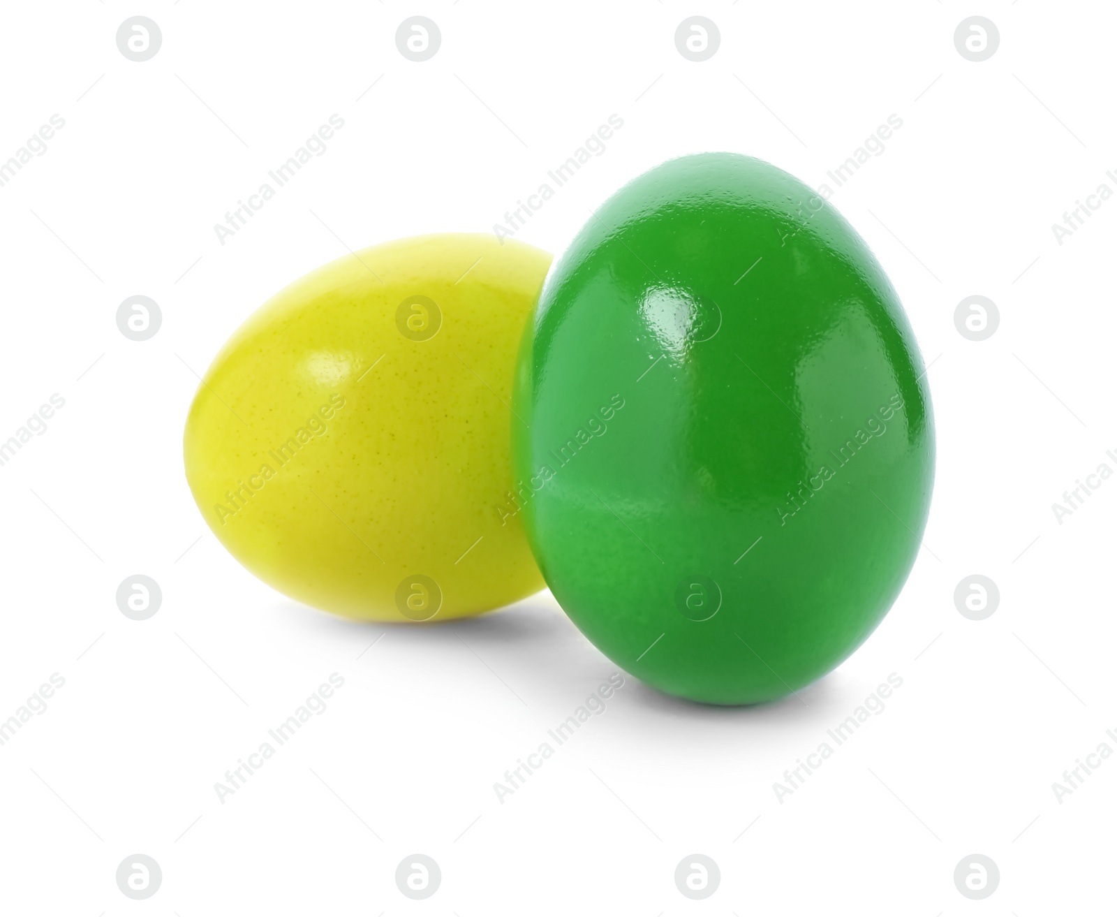 Photo of Dyed Easter eggs on white background. Festive tradition