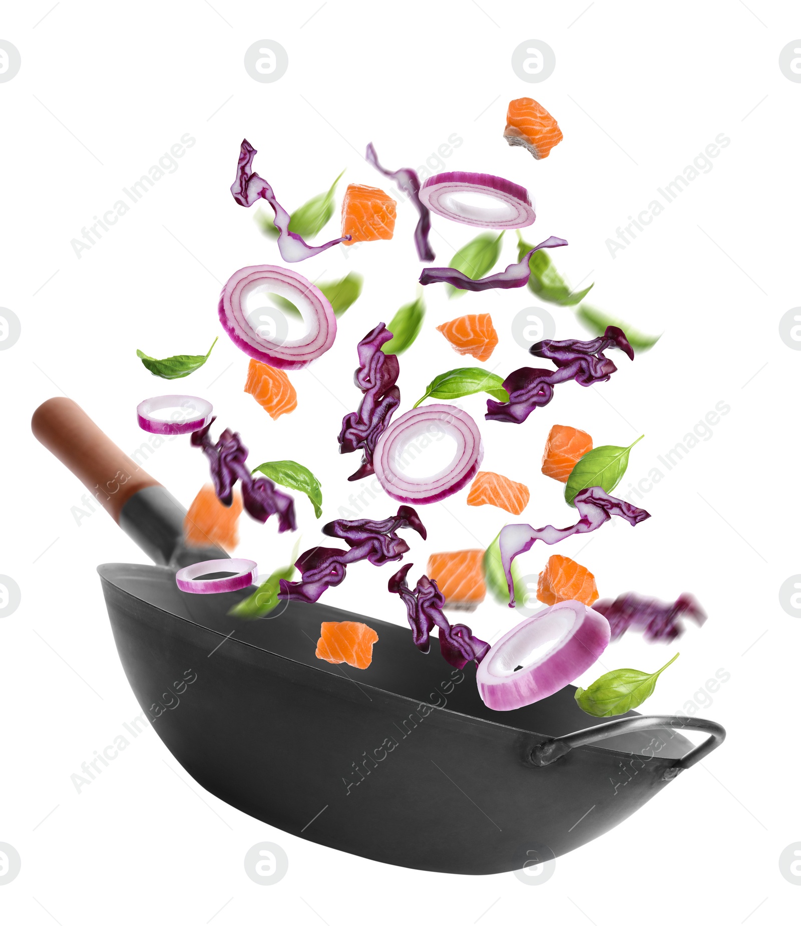 Image of Different tasty ingredients falling into wok on white background