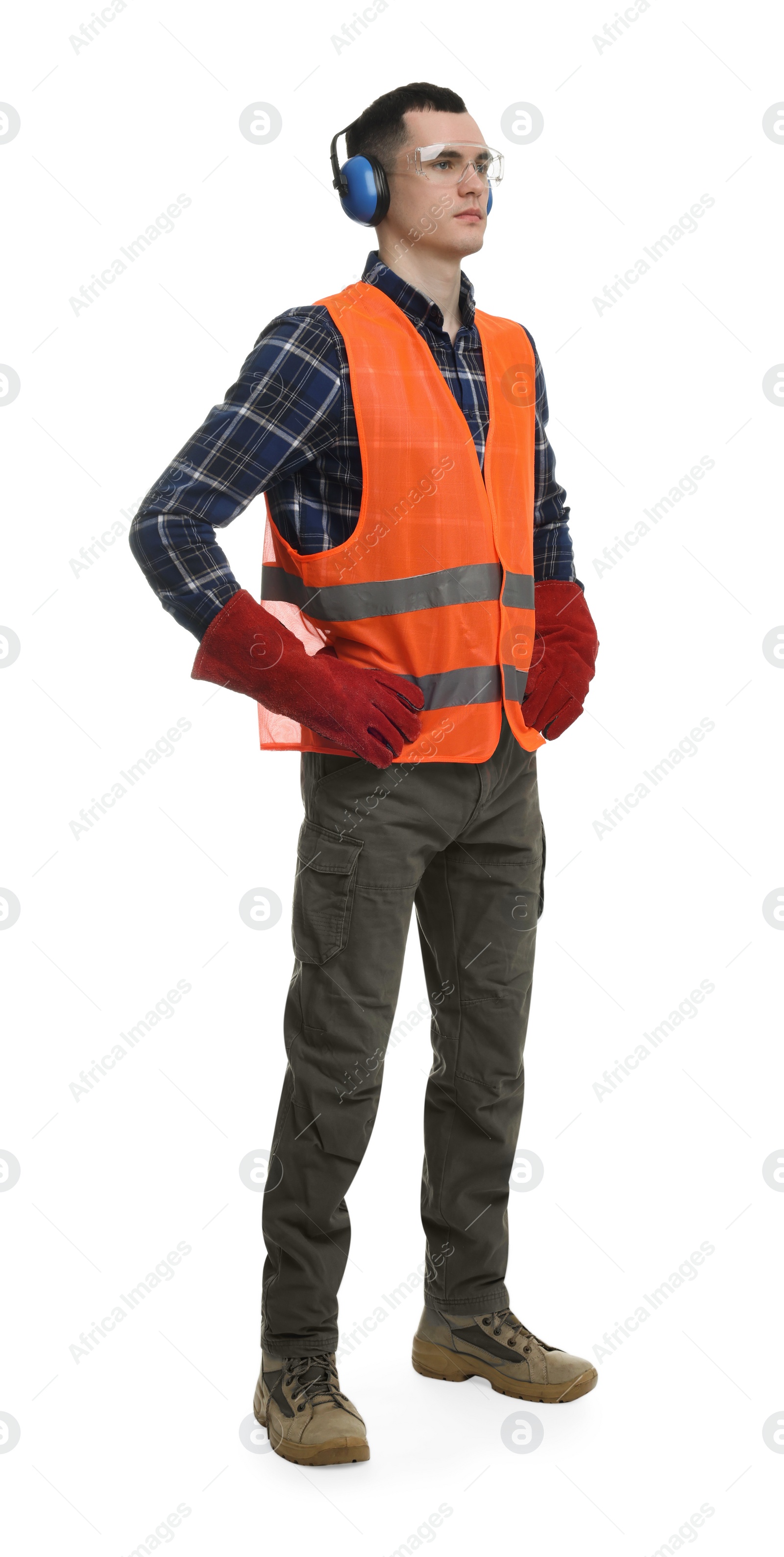 Photo of Young man wearing safety equipment on white background