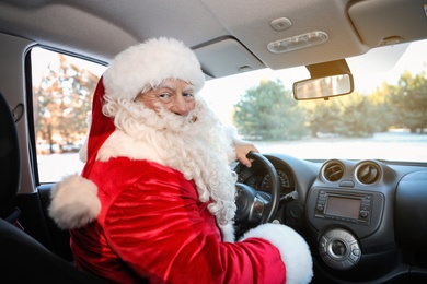 Photo of Authentic Santa Claus in car, view from inside