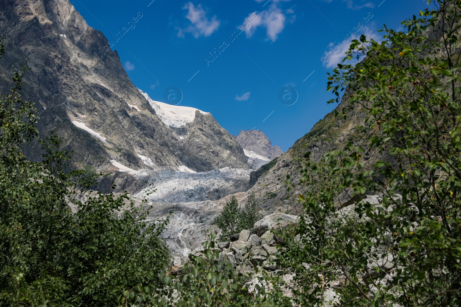 Photo of Picturesque view of mountains under cloudy sky