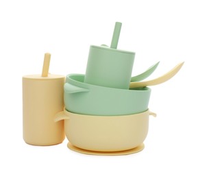 Set of plastic dishware on white background. Serving baby food