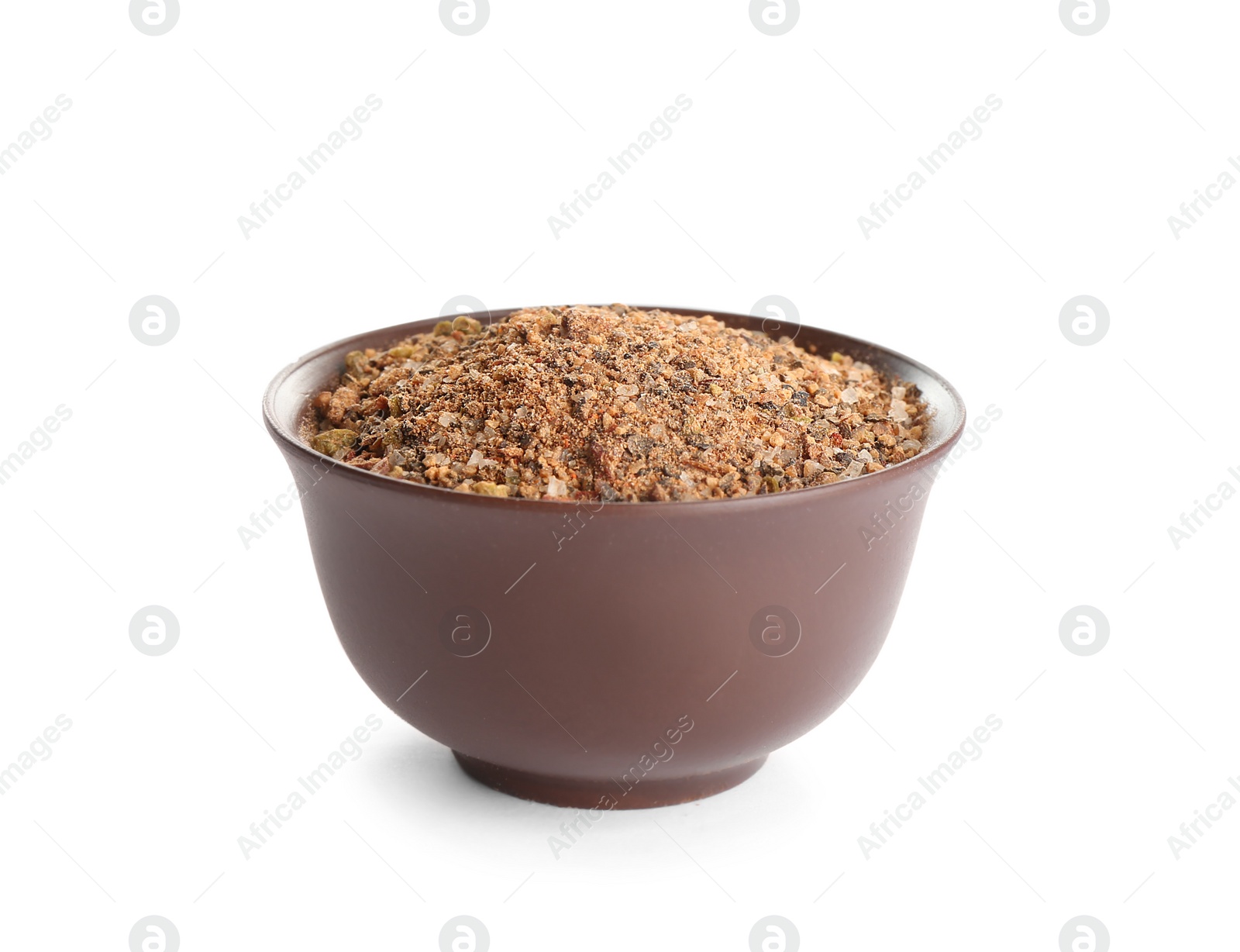 Photo of Bowl of ground pepper isolated on white