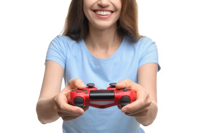 Smiling woman playing video game with controller on white background, closeup