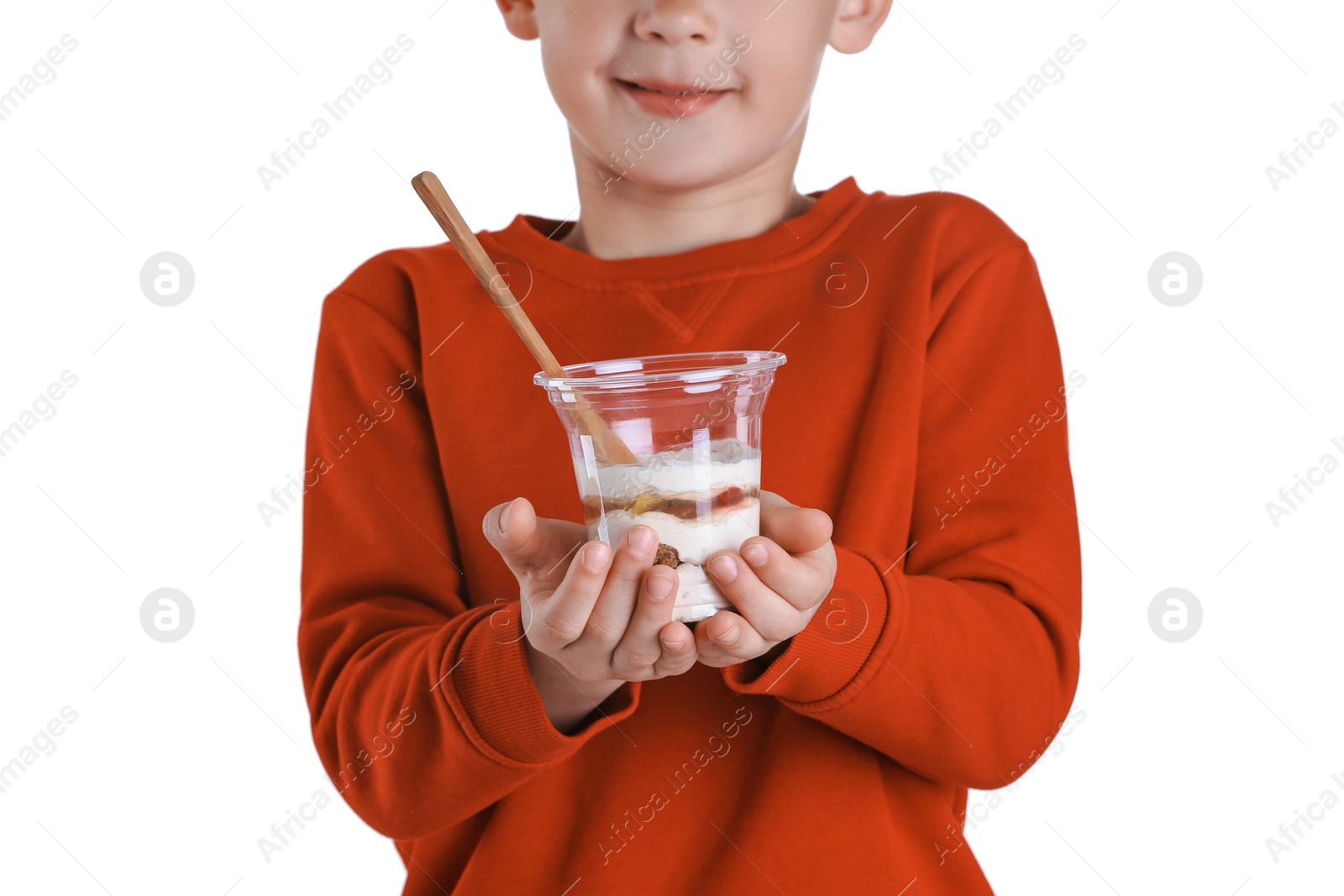 Photo of Little boy with yogurt on white background, closeup