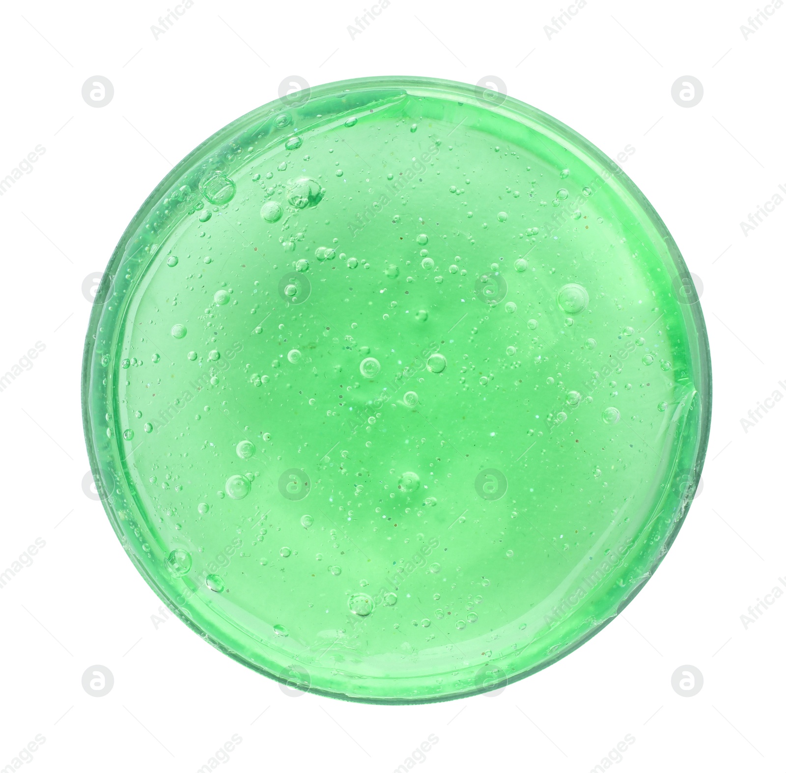 Photo of Green slime in plastic container isolated on white, top view. Antistress toy