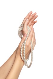 Woman holding elegant pearl necklace on white background, closeup